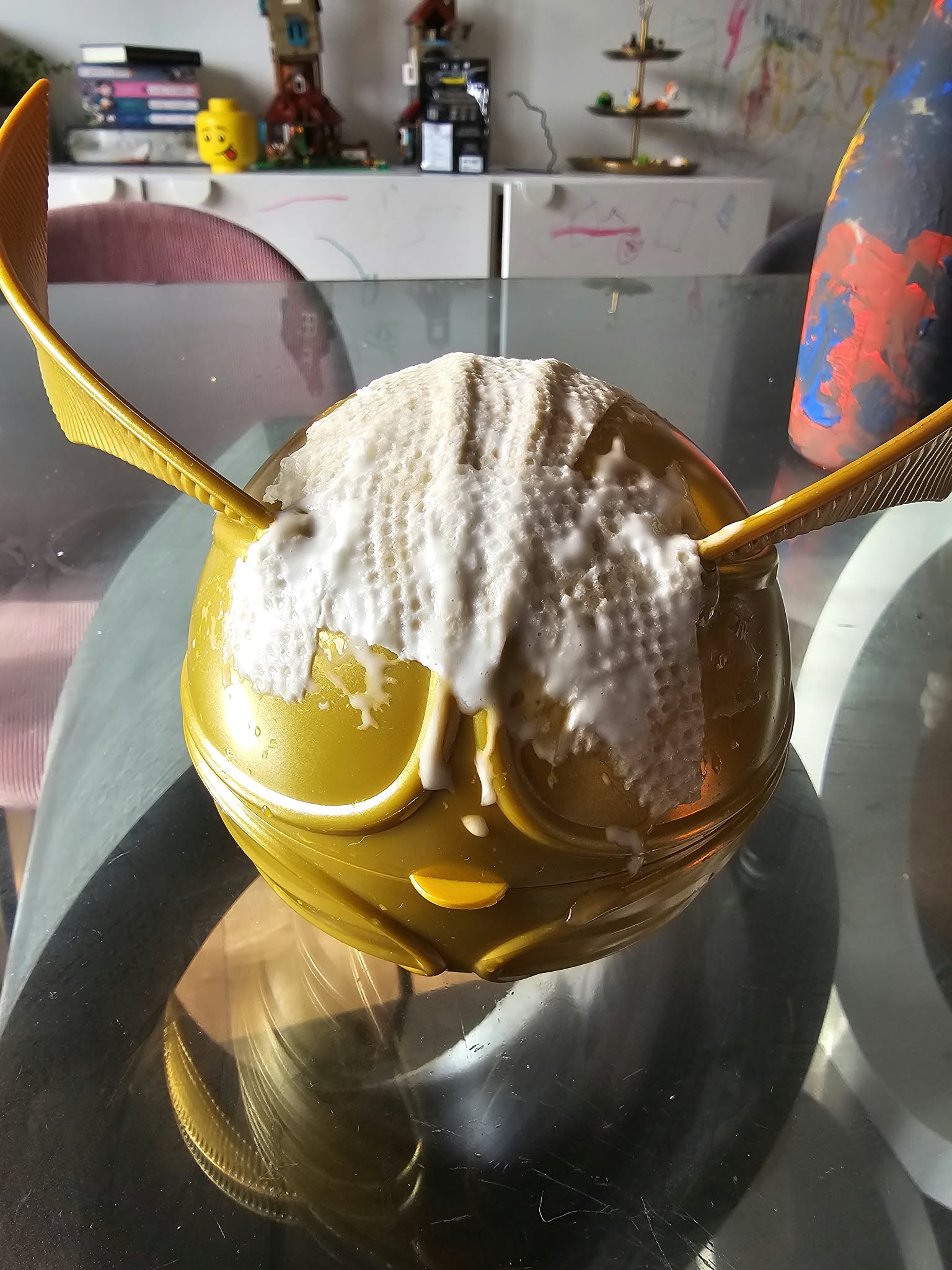 Front view of the Golden Snitch holder partly covered with glued paper towel for texture.